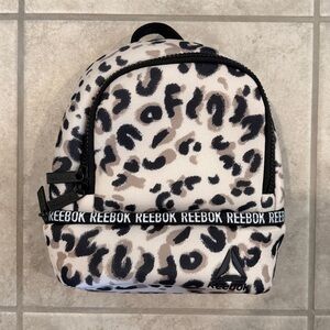 Reebok Animal Print Backpack in Black and Tan